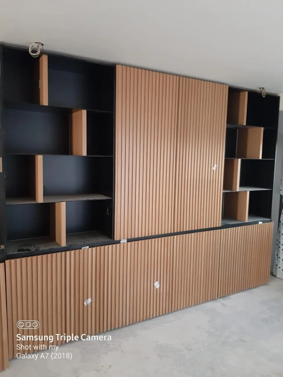Custom bookshelf cabinetry, Dubai villa interior fit-out — photo 1