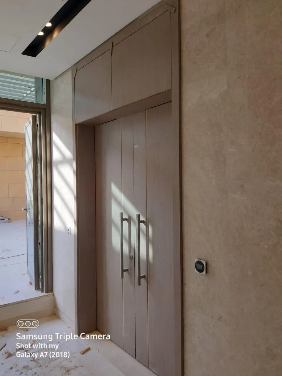Feature door installation, Dubai villa interior fit-out — photo 2