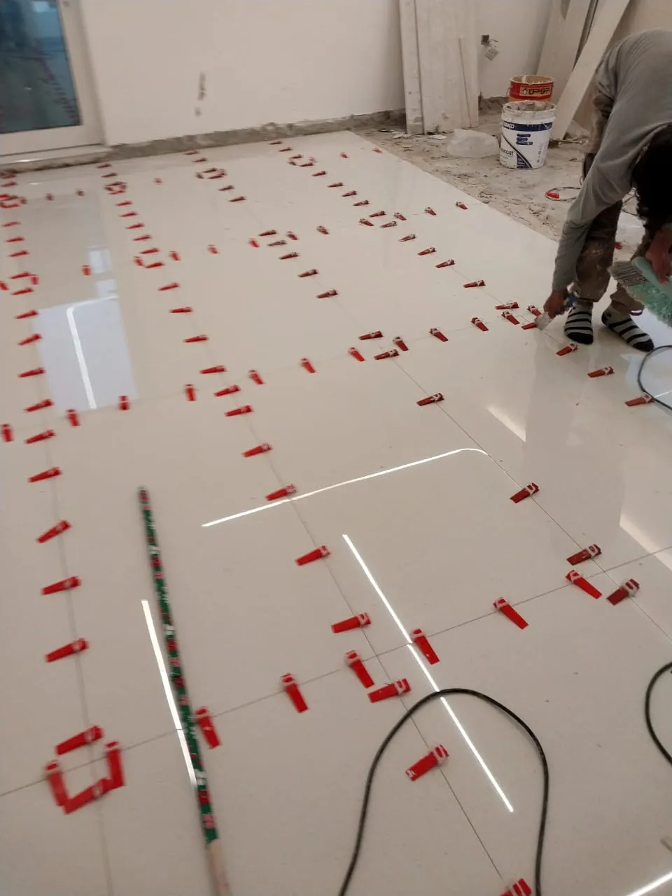 Large-format floor tile installation, Dubai villa interior fit-out — photo 2