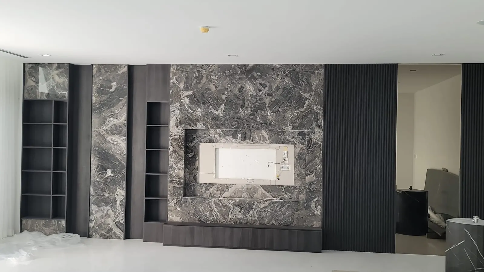 Living room TV feature wall, Dubai villa interior fit-out — photo 6